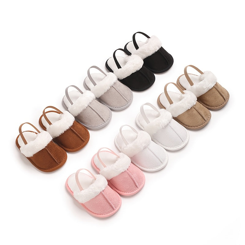 Soft and cozy plush baby girl slippers with non-slip sole for indoor comfort, perfect for 0-1 year olds in spring and fall.