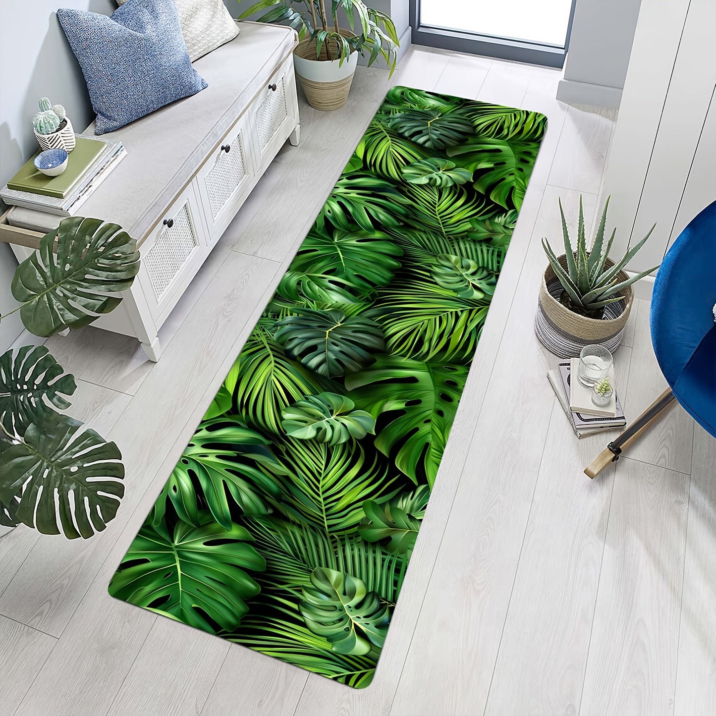 Soft non-slip area rug for living room and kitchen featuring a green leaf pattern. Machine made from polyester, this braided mat is hand wash only. It is in a rectangle shape with a weight of 480gsm and a thickness of 1cm.