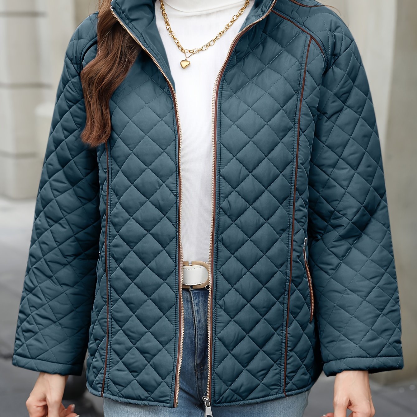 Women's plus size casual quilted outerwear with stand collar, zipper, and long sleeves. Made of 100% non-stretch solid woven polyester for fall/winter.