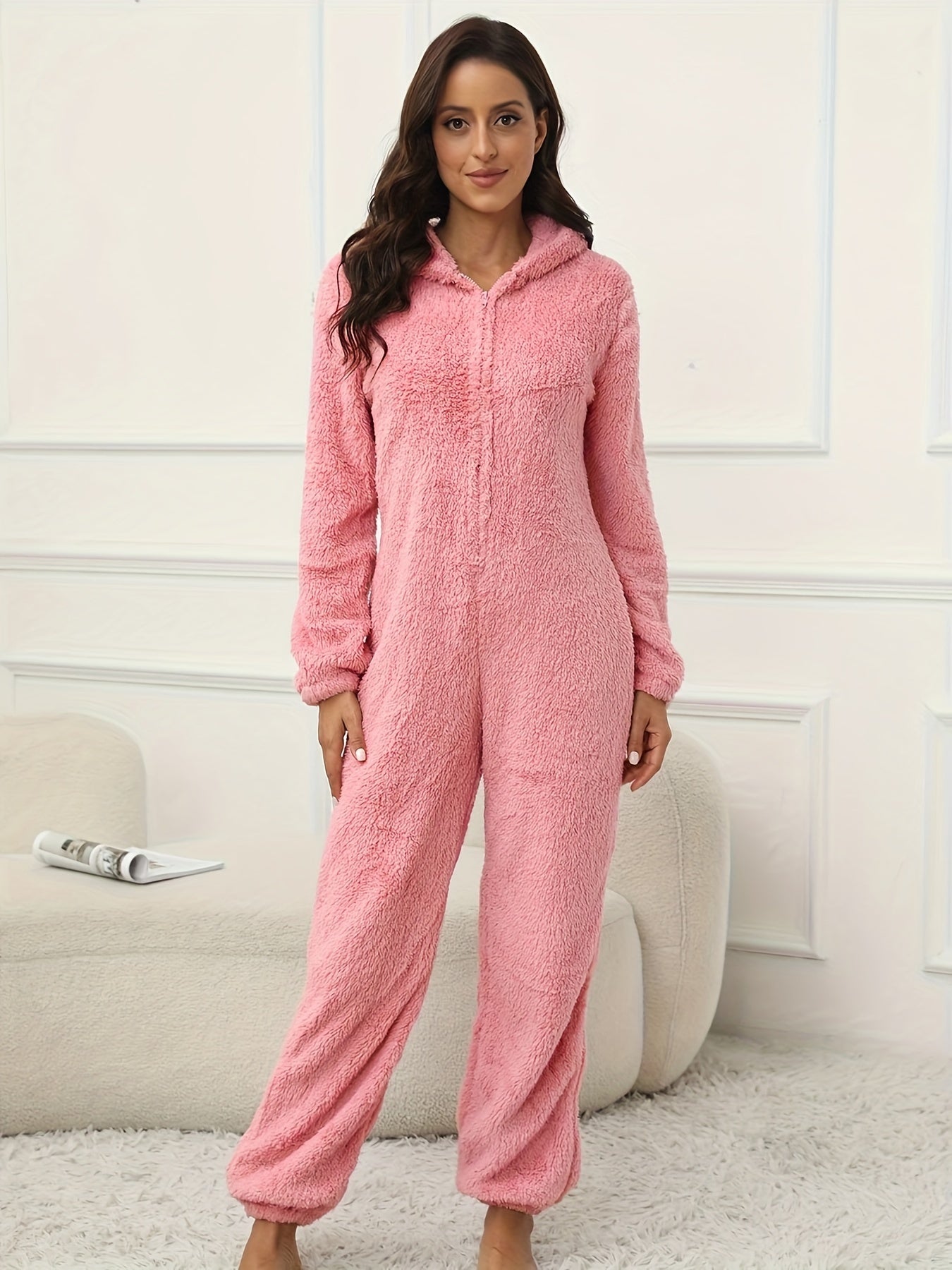 Hooded lounge jumpsuit with fuzzy fabric, zippered front, perfect for women's loungewear and sleepwear.