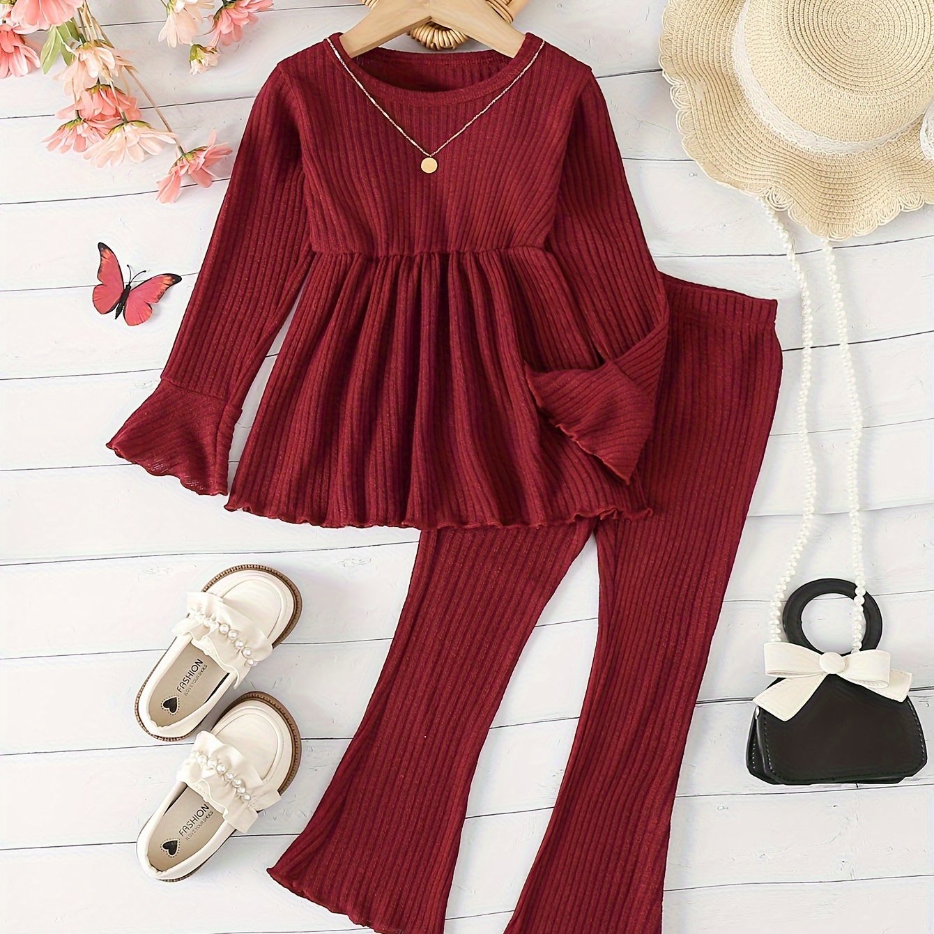 2-piece girls outdoor clothing set features solid color fashion pit stripe flared long sleeve top and pants.