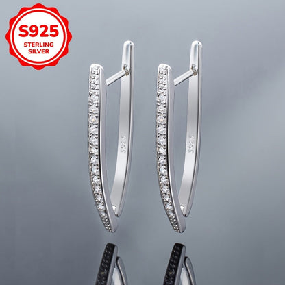 These stunning women's fashion earrings boast a high-end, sophisticated design with V-shaped inlaid synthetic zirconia, weighing 5.5 grams in a silvery hue. Perfect for everyday wear, vacations, parties, banquets, or as a luxurious gift.