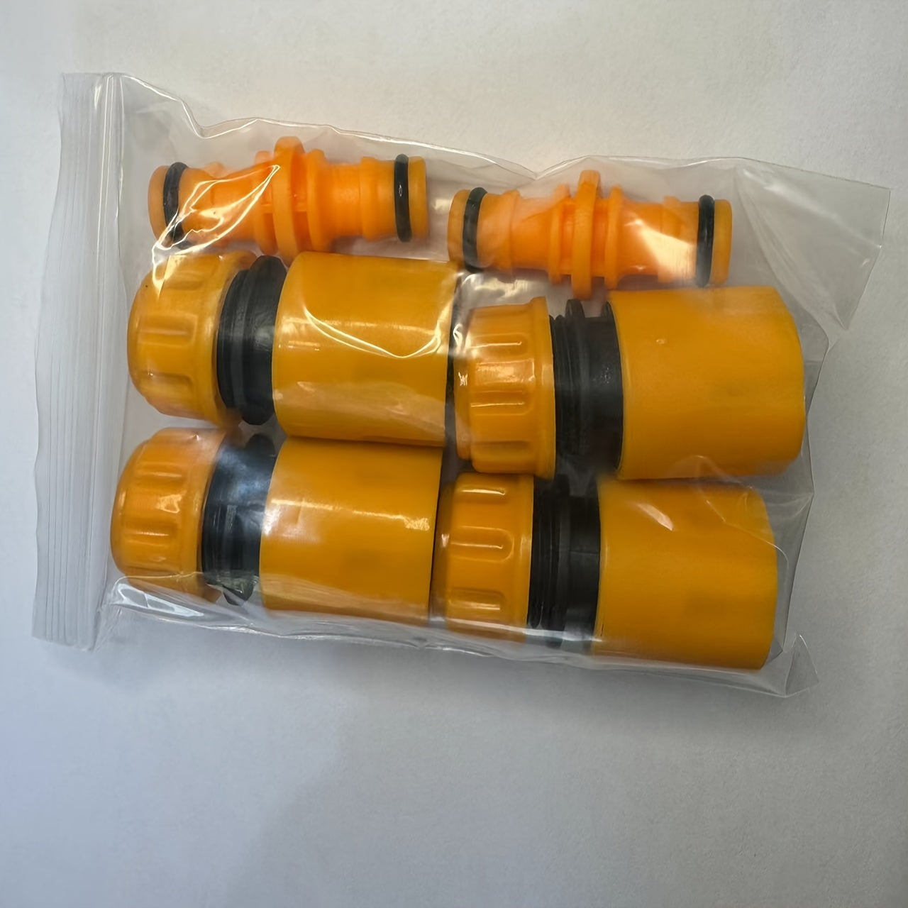 1 set of 2 combined water pipe fittings including universal nipple fittings, rubber yellow nipple fittings, and anti-drop water pipe inlet.