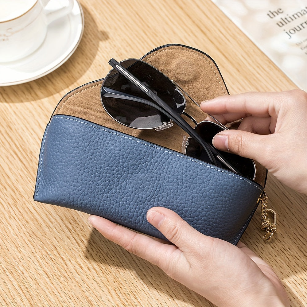 Portable eyeglasses case holder made of genuine leather with a magnetic closure, suitable for storing sunglasses and reading glasses.