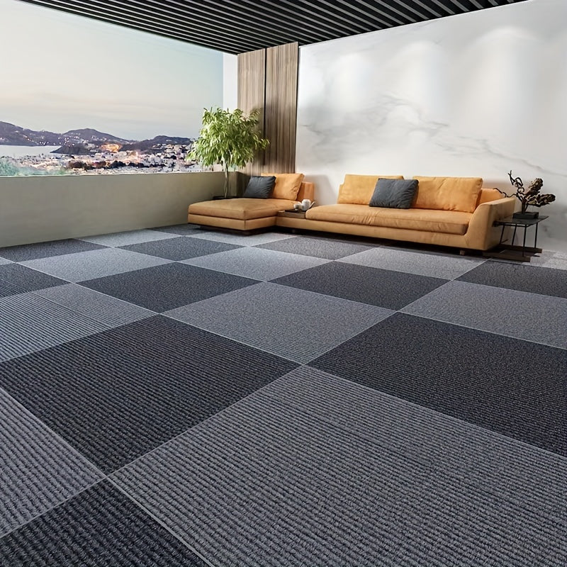 Pack of multiple self-adhesive carpet tiles in a square shape, suitable for both office and home use. These non-slip foam backed polyester rugs are machine-made with a solid pattern, making them perfect for enhancing the decor of any room, office, or