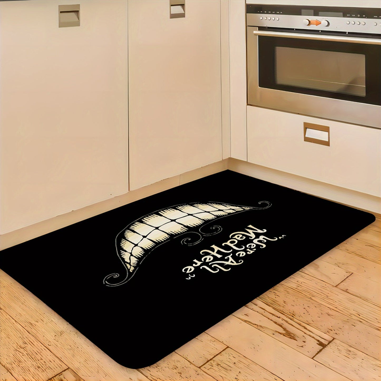 Welcome to Cheshire Smile Doormat - A soft and absorbent entrance mat made from polyester fleece, featuring a charming tooth and letter print design. This 1cm thick mat is anti-slip and perfect for your living room, bedroom, front door, or hallway. Add a