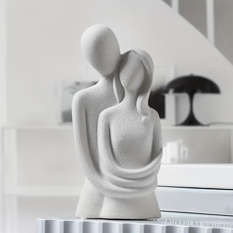 Abstract couple sculpture for indoor/outdoor decor.