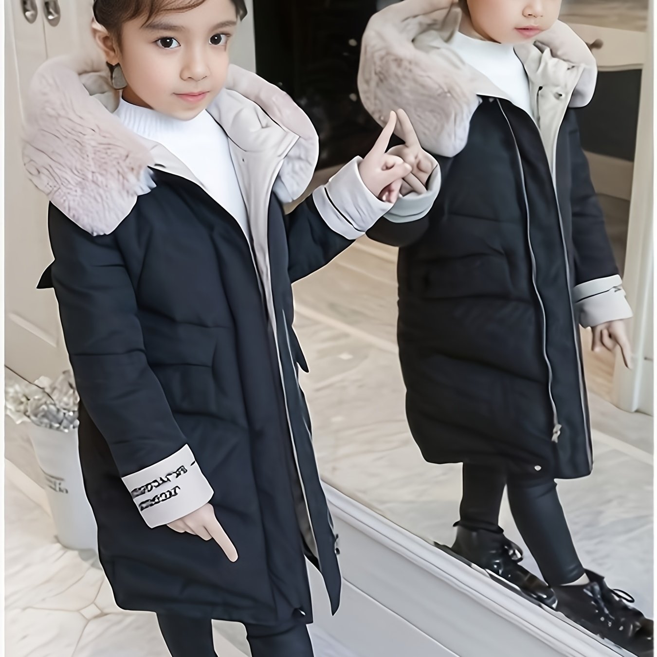 Stylish mid-length winter coat with faux fur hood for Korean fashion lovers. Made of 100% polyester and machine washable, with striped cuffs for added flair.