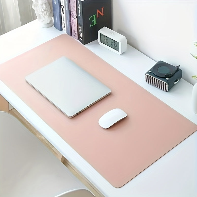 Black non-slip desk mat for office, ideal for computer and mouse.