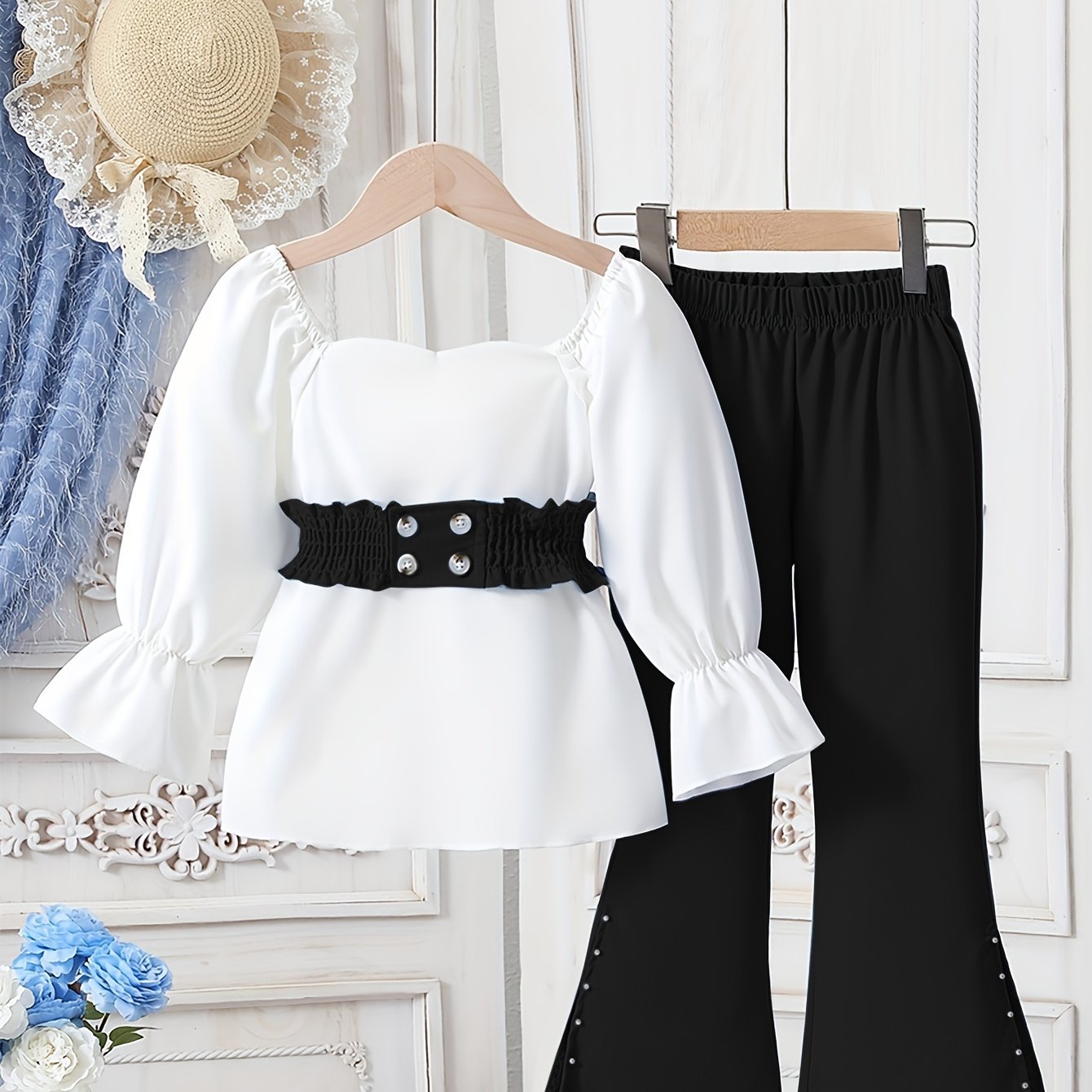 Girls' long pants suit including a waist-cinched long-sleeved top and fashionable bell-bottom pants, suitable for outdoor wear in spring and autumn.