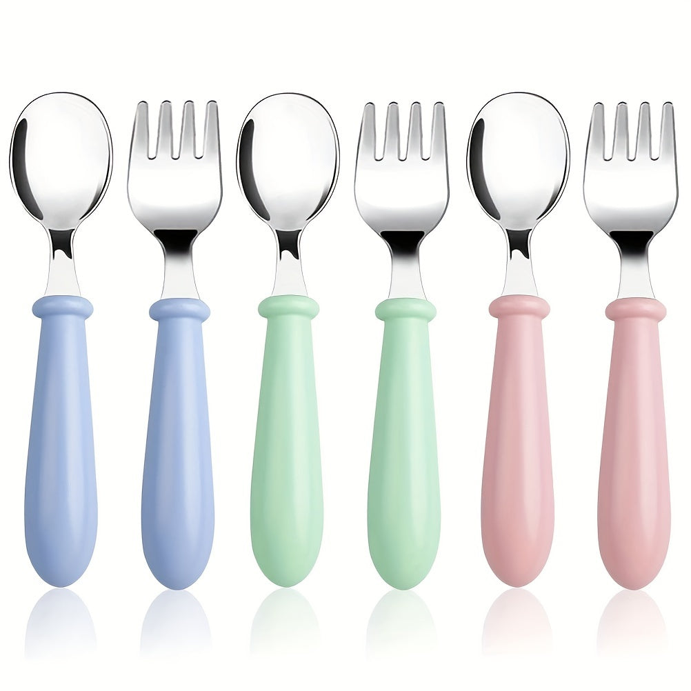 6-piece flatware set made of stainless steel spoons and forks with safe rounded edges and BPA-free handles, designed for easy cleaning and featuring an ergonomic design suitable for young hands.