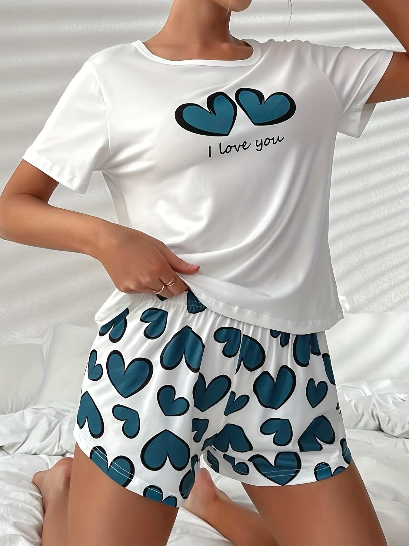 Women's Heart Print Pajama Set with Crew Neck Top and Elastic Waistband Shorts for Sleepwear and Loungewear.