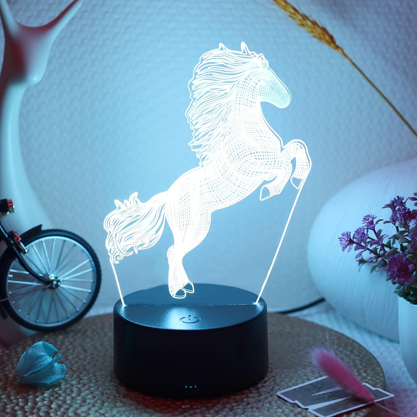 The 1pc Plug-in 3D Night Light is a creative jumping horse decoration for desks or bedrooms.