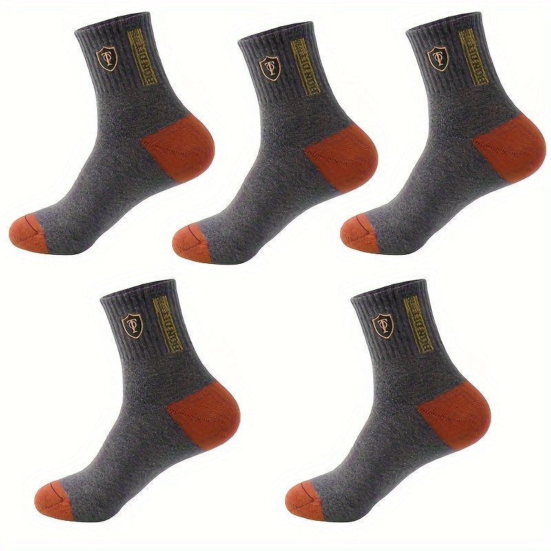 5 pairs of comfortable, trendy crew socks for men, breathable and soft for casual wear.