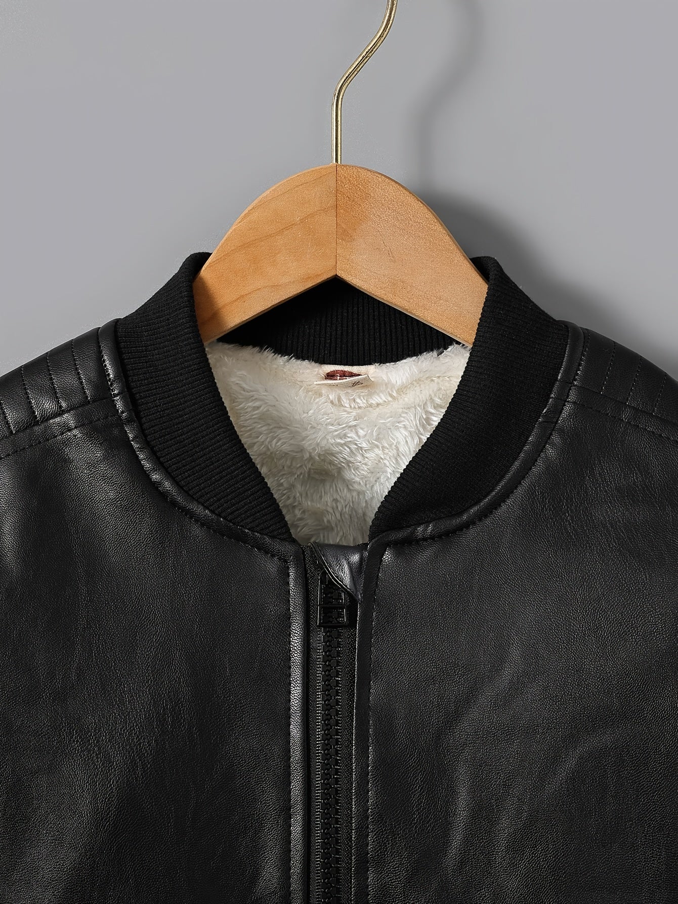 Boys' fleece-lined zip-up jacket for fall/winter, with stand collar.