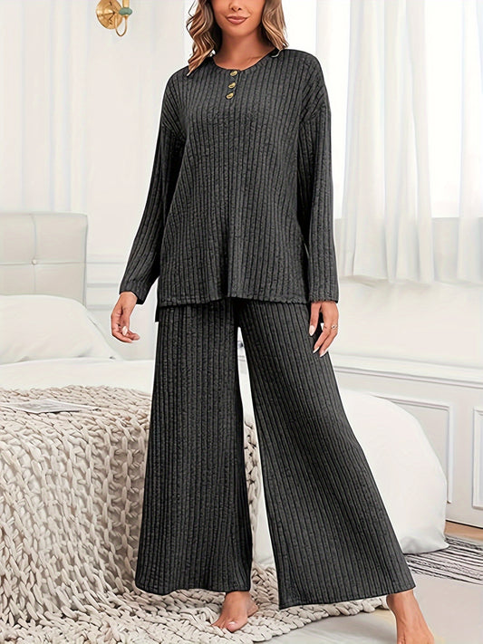 Women's casual suit with ribbed knit top and matching hooded wide-leg pants.