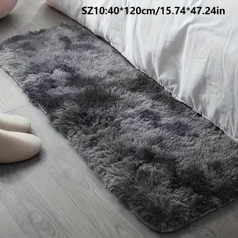 Long fleece carpet in a dark grey tie dye gradient, perfect for the living room coffee table or bedroom decor. This washable mat is fully padded and makes a great Halloween or Christmas gift.