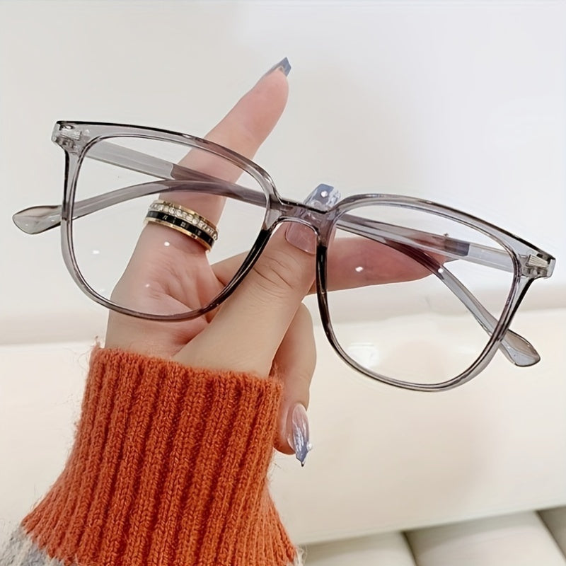 Stylish PC frame glasses with clear polycarbonate lens and gradient design, perfect for everyday wear for both men and women.