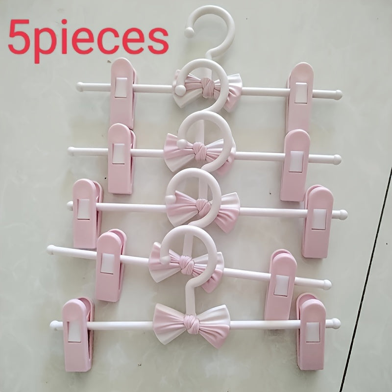 Convenient 27.94-68.58 cm Retractable Plastic Pants Hanger with Bow Clips - Ideal for Children's Clothing