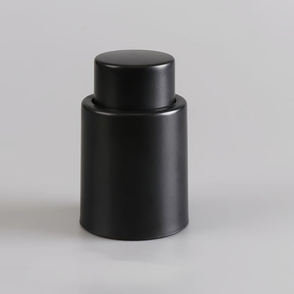 Polypropylene vacuum wine stopper preserves freshness by removing air with one press, keeping red wine bottles fresh and reusable.