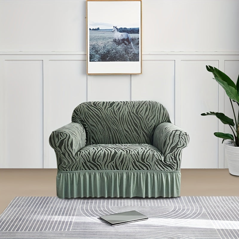 Wave pattern sofa slipcover with skirt, non-slip and dustproof. Protects furniture from cat scratches. Machine washable for easy cleaning. Suitable for bedroom, office, or living room décor.