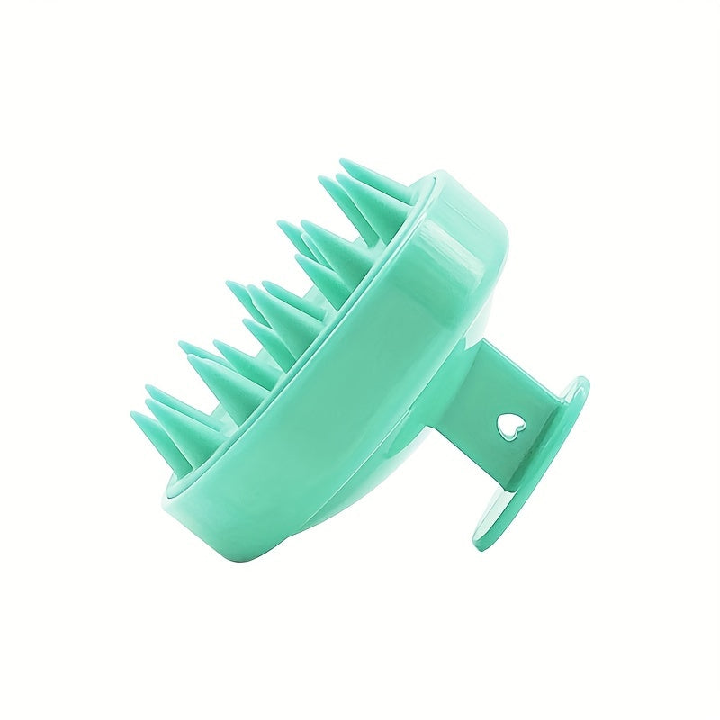 Silicone scalp massager with gentle exfoliating shampoo comb. No batteries needed, comes in 3 colors.