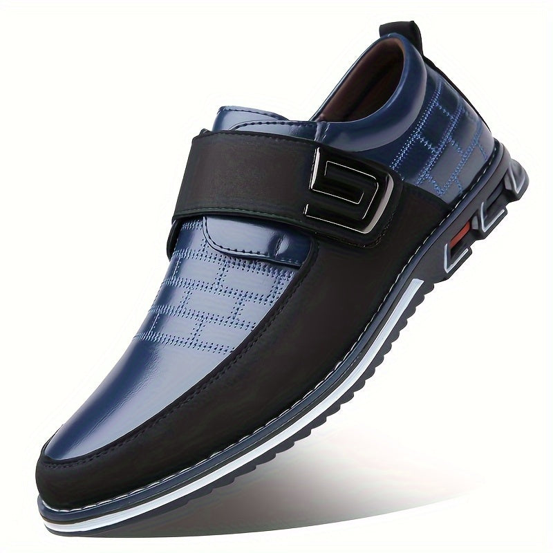 Men's dress loafers with hook and loop fastener for business or casual wear.