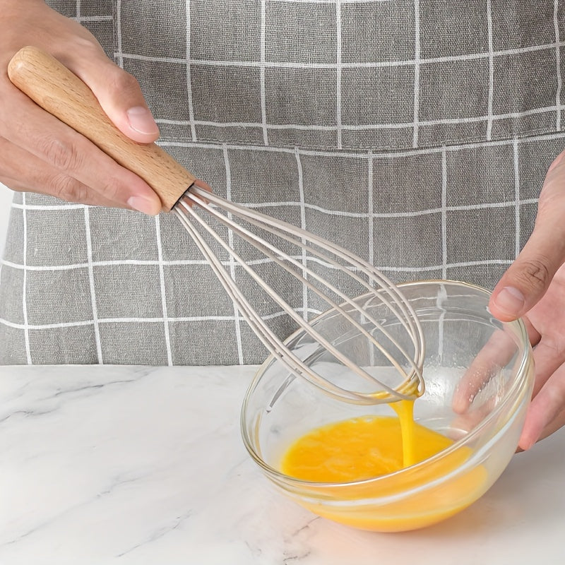 Set of 12 silicone utensils with khaki color and wooden handles, ensuring safety while cooking. These non-stick kitchen tools are washable and modern, providing a range of cookware and gadgets for your kitchen.