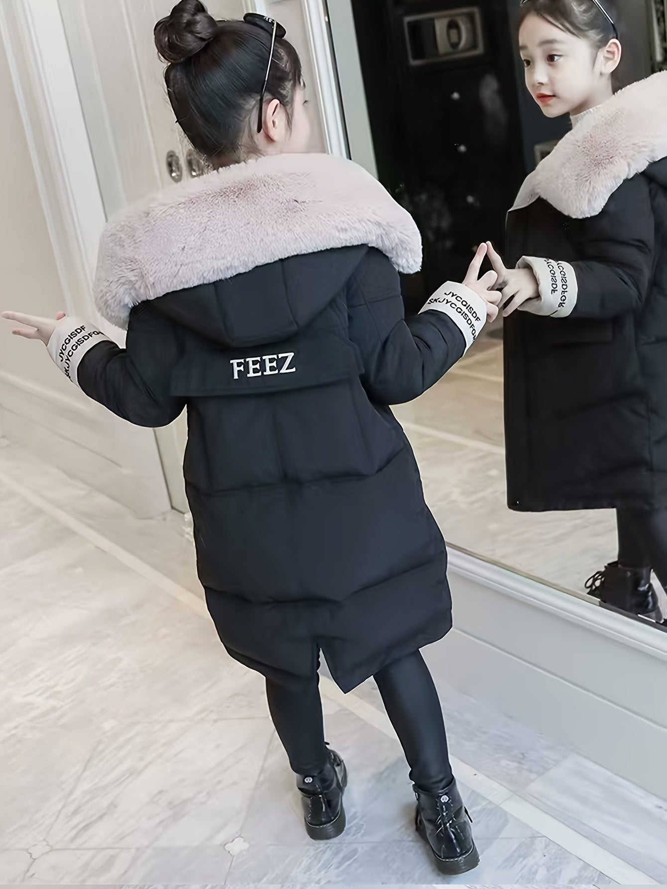 Girls' winter puffer coat with faux fur hood, embroidered alphabet detail, and casual skinny fit. Made of woven polyester, this thick warm jacket is perfect for cold weather.