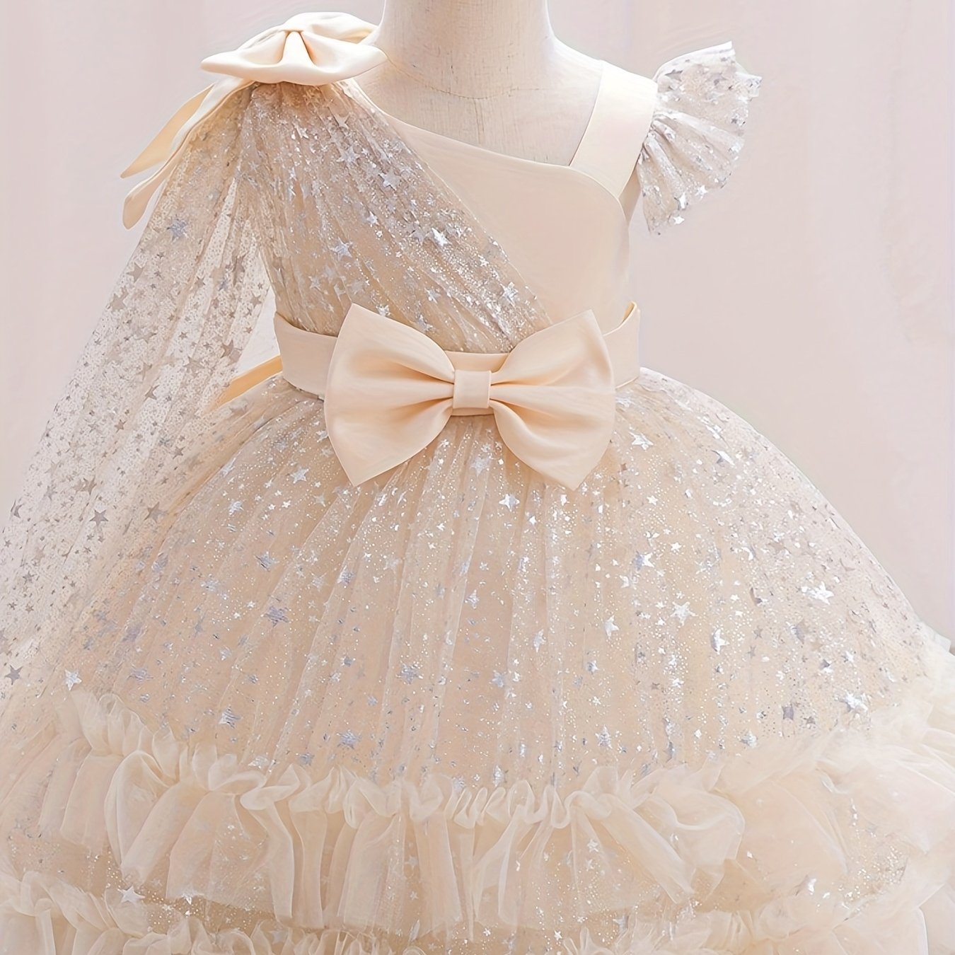 Princess dress for girls with one-shoulder ruffle sleeves, sparkling sequins, and a fluffy design, ideal for weddings, birthdays, and parties.