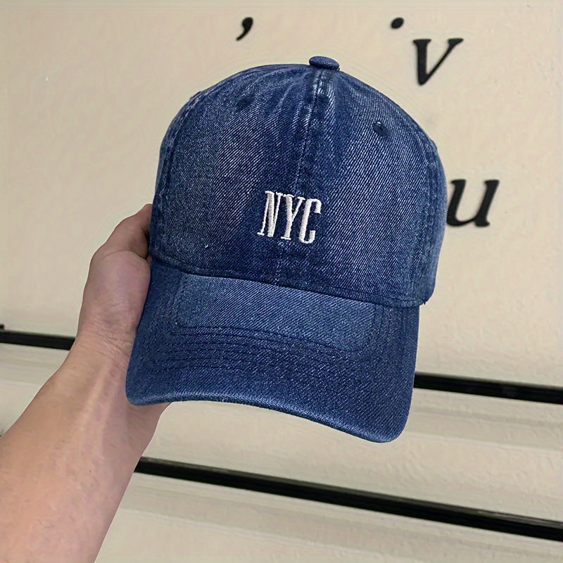 Casual-style denim baseball cap with embroidered NYC logo, adjustable unisex fashion hat for outdoor activities.