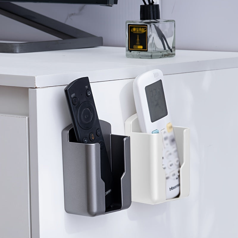 Wall-mounted Remote Control Storage Box for small items in various rooms.