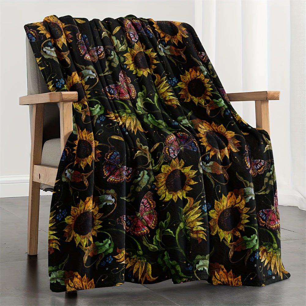 One piece of a Sunflower Throw Blanket made of soft and warm fleece, featuring an all-season floral pattern. This multi-use blanket is a perfect gift for use on the sofa, in the office, on the bed, or while camping. It is crafted from 250-300g superfine