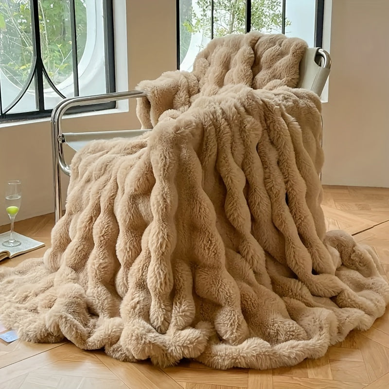 One piece of decorative soft and thick fuzzy faux rabbit fur throw blanket for couch or sofa. This reversible plush warm fleece blanket is perfect for winter, providing luxury and coziness. The cute and furry cream white blanket is also ideal for bed.