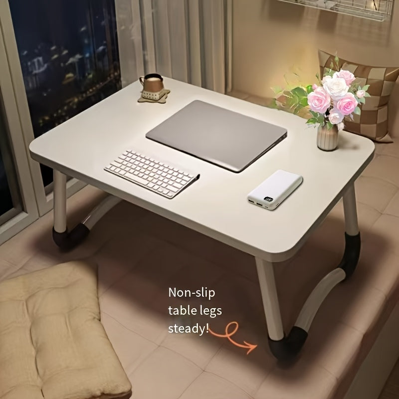 Portable folding laptop desk with nonslip legs, compact for home and dorm use, sturdy wooden stand with rounded corners.