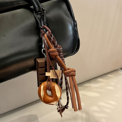 Rock-inspired Sports Faux Leather Keychain featuring Chocolate, Pretzel, and Donuts Charms, Yarn Rope, and Tassel - Unique Trendy Accessory for Bags and Backpacks