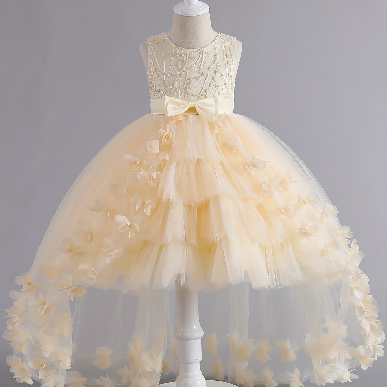 Girls' sleeveless princess gown with floral embroidery and tulle skirt, perfect for pageants, weddings, and formal events. Machine washable, made of polyester.