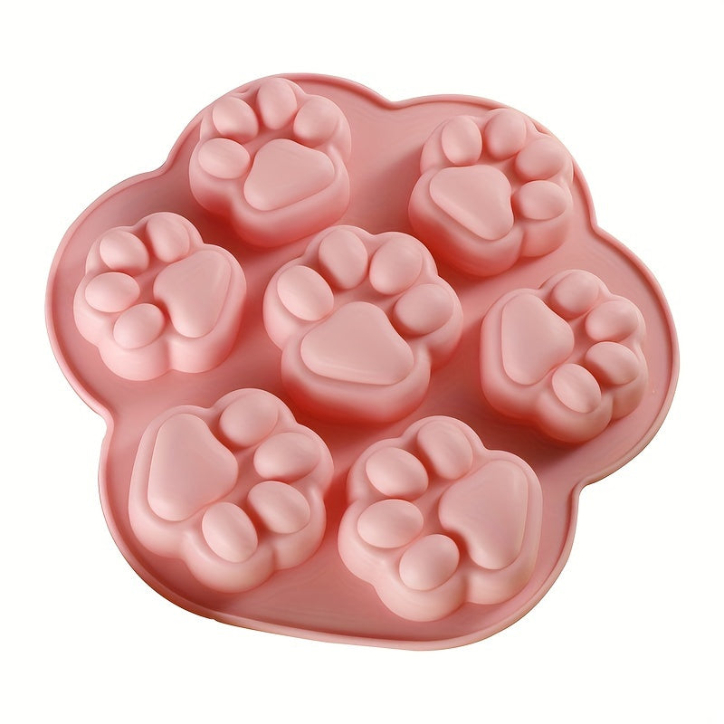 Pink Silicone Paw Print Treat Mold with 7 cavities - non-stick, food-grade silicone for baking a variety of treats including dog treats, cookies, candy, chocolate, and jelly. Perfect for baking with silicone molds.