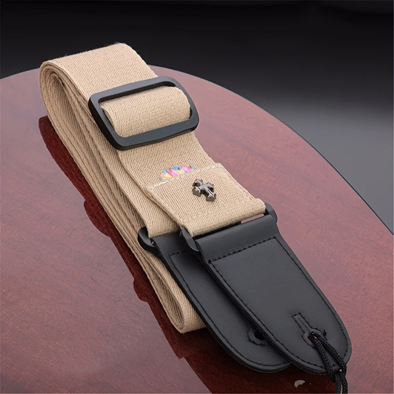 Vintage electric guitar strap with cross design and pick pocket, suitable for acoustic, folk, bass, and ukulele.