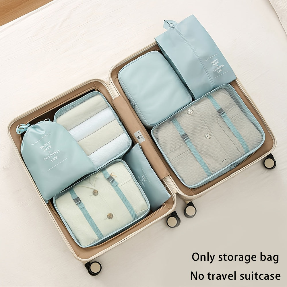 Waterproof travel organizer bag, includes seven pieces for clothes, pants, shoes, and socks.