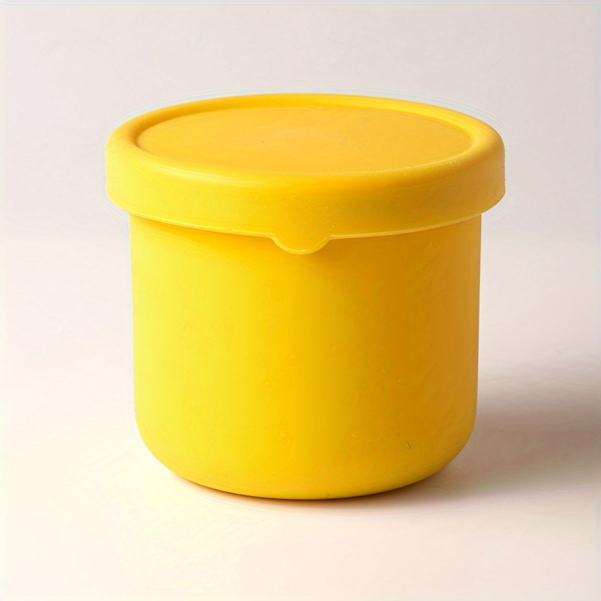 Multi-functional Storage Container made of Silicone - Does not contain BPA, can be used in the Microwave and Freezer. Ideal for storing Fruits, Vegetables, and Lunch items. Circular Kitchen Container with a convenient Flip-Top Cover.