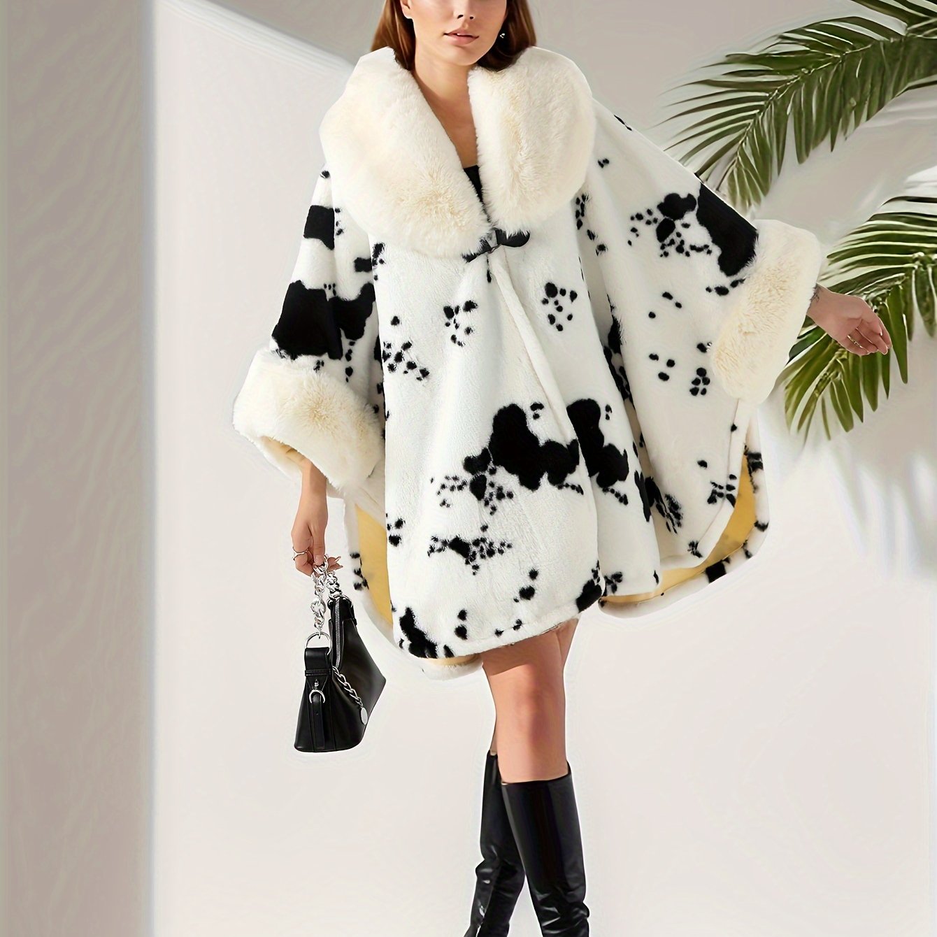 Thick faux fur bat style cardigan with animal print.