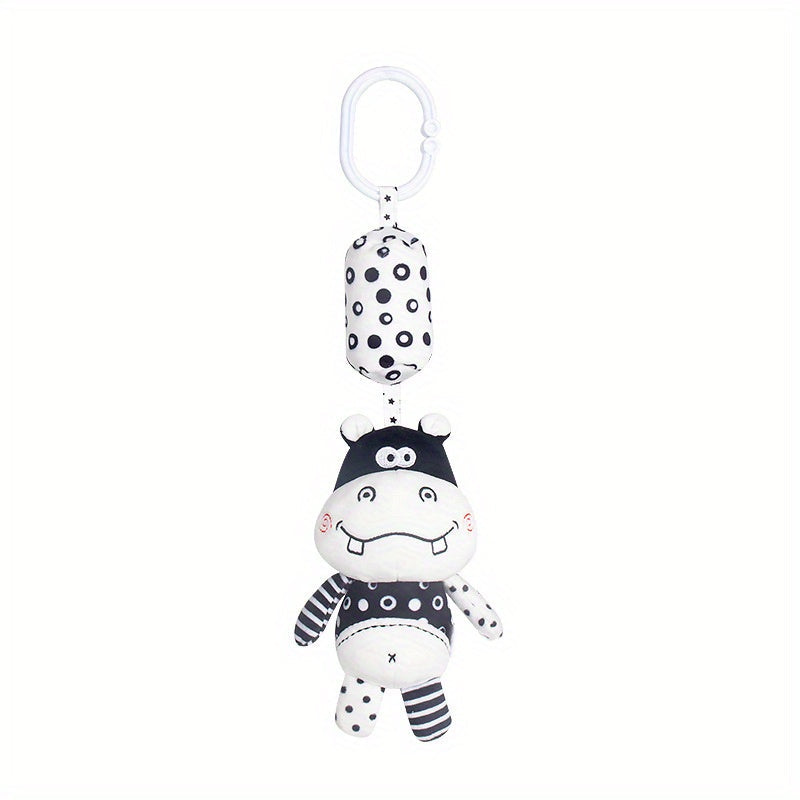 Black and white rattle wind chime for visual training in babies, perfect for early education and development. Makes a great gift for babies and toddlers.