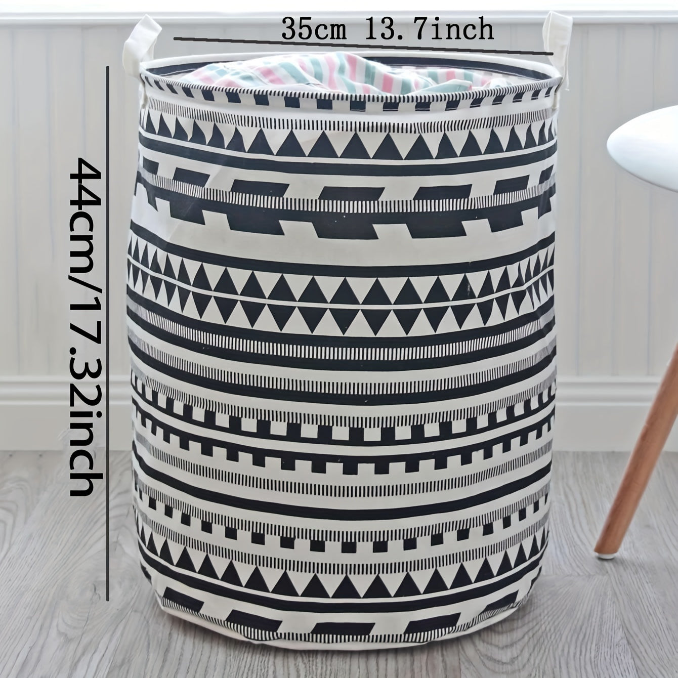 Large capacity fabric hamper for storing dirty clothes and linens, featuring a geometric design. This foldable storage basket can also be used for organizing clothes, dolls, and other items in your bathroom, bedroom, living room, or dorm. A stylish and