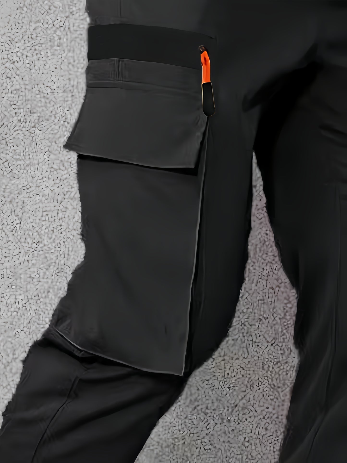 Men's casual cargo pants made of 100% polyester with an elastic waist, multi-pocket design, regular length, and loose fit for spring and fall wear.