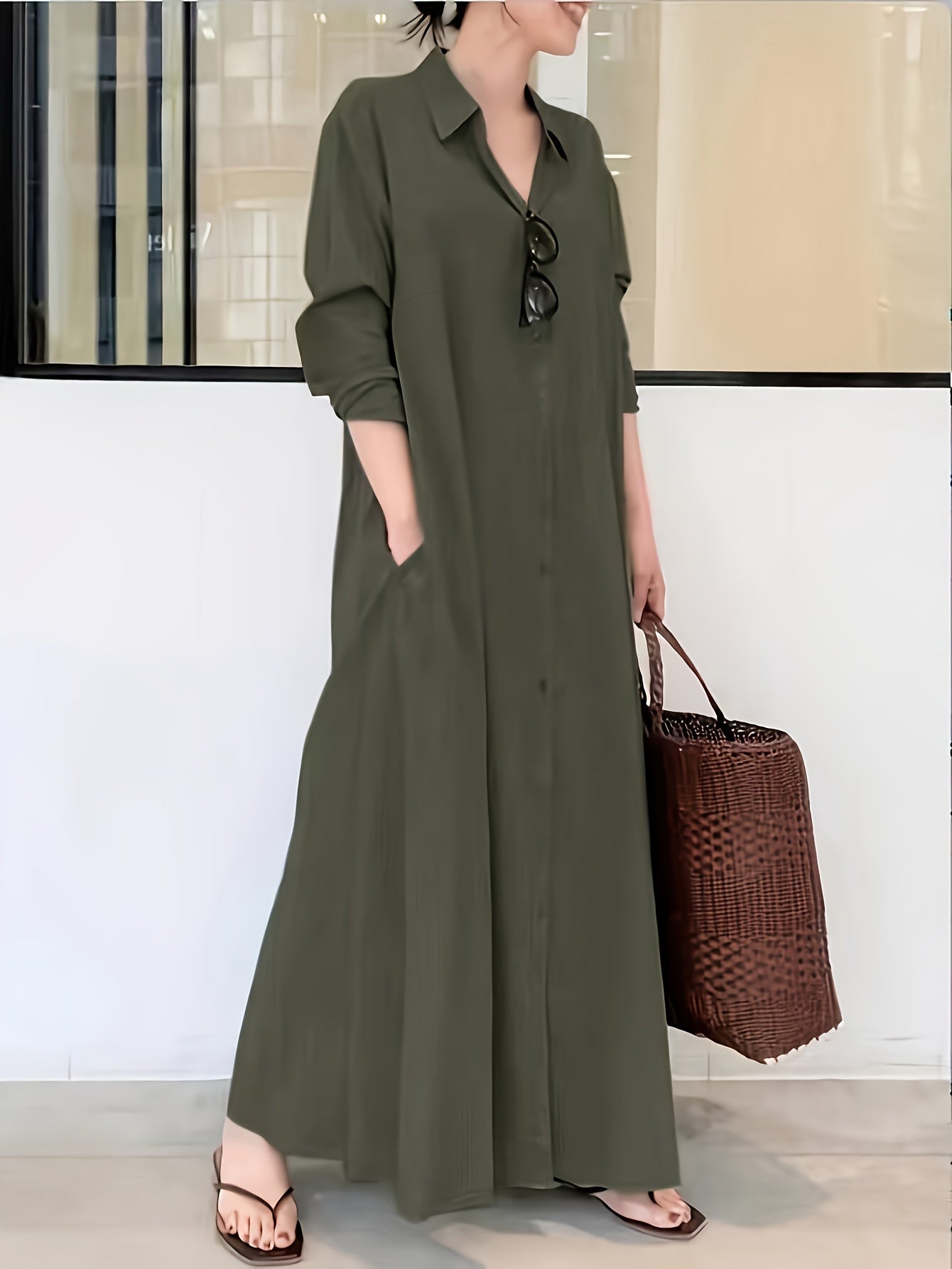 Button front shirt dress in solid color, loose fit maxi style with long sleeves for spring and fall.