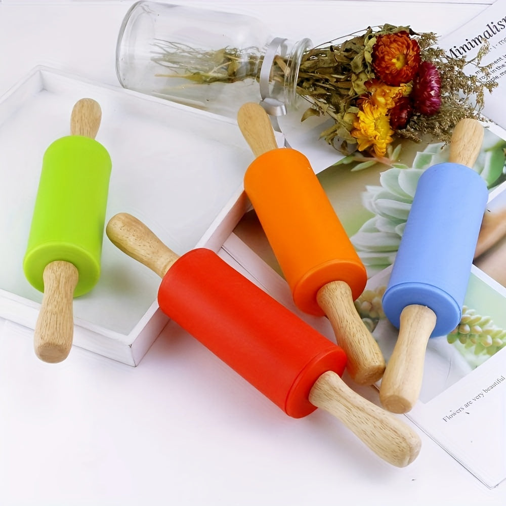 Small rolling pin suitable for kids with a wooden handle and non-stick silicone dough roller, ideal for baking activities.