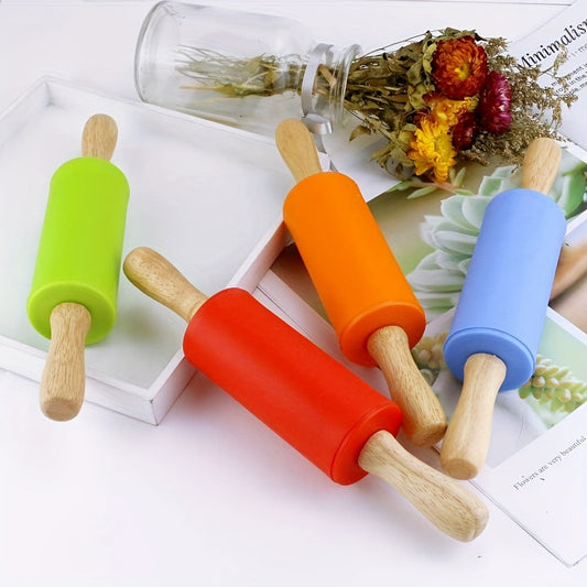 Small rolling pin suitable for kids with a wooden handle and non-stick silicone dough roller, ideal for baking activities.