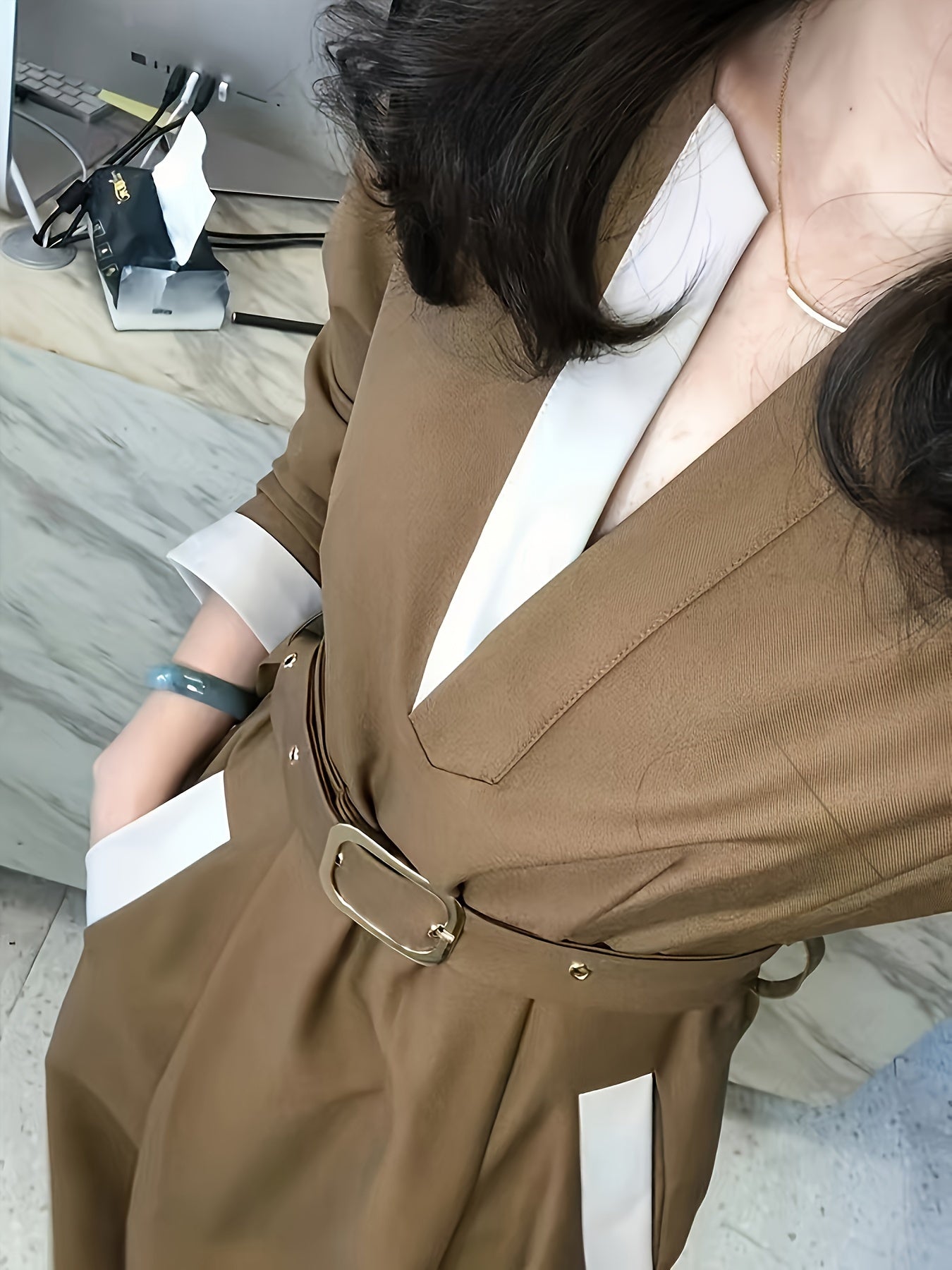 Stylish midi dress in solid brown polyester with V-neck, A-line cut, belt, and long sleeves. Suitable for spring, summer, or fall, and is machine washable.