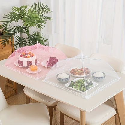 Lace mesh food cover that pops up like an umbrella to protect food from dust, reusable and collapsible design for table, kitchen utensil.